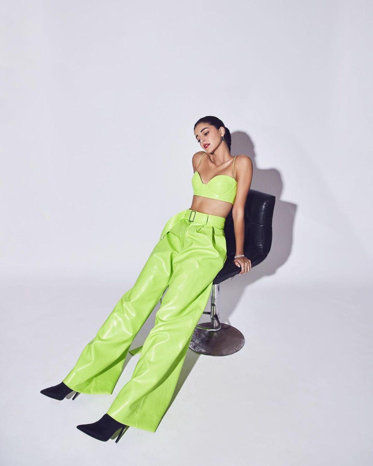Ananya Panday looked chic in a neon Alex Perry crop top and pants. Styled by Meagan Concessio, she was a sight to behold. She paired the outfit with black heels
